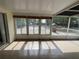 A screened in porch with outdoor view at 8291 Weeping Willow St, Brooksville, FL 34613