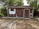 Charming shed with custom mural of herons and other birds at 8291 Weeping Willow St, Brooksville, FL 34613