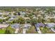 Aerial view of the neighborhood with tree-lined streets, showing community at 10139 Carrin Rd, Spring Hill, FL 34608
