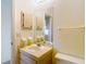 Bathroom featuring a vanity with sink, mirror, and cabinets for storage at 10139 Carrin Rd, Spring Hill, FL 34608