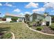 Beautiful front yard with manicured landscaping, creating a welcoming entrance to this charming home at 10277 Rosetti Ct, Spring Hill, FL 34608