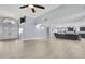 Spacious living room boasts high ceilings, modern flooring, and ample natural light at 10277 Rosetti Ct, Spring Hill, FL 34608