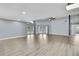 Bright living room features hardwood floors, skylights, and access to the backyard at 10277 Rosetti Ct, Spring Hill, FL 34608