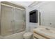 Bathroom with a tub/shower combination and a vanity with cabinet at 1084 Vista Fina Ct, Spring Hill, FL 34608