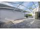Enclosed patio with brick flooring and plenty of sunlight, great for entertaining or relaxing outdoors at 1084 Vista Fina Ct, Spring Hill, FL 34608