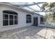 Enclosed patio with a screen door and windows, a great area to relax in while still being outdoors at 1084 Vista Fina Ct, Spring Hill, FL 34608