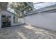 Enclosed patio with plenty of space and a screen door that allows access to the exterior of the home at 1084 Vista Fina Ct, Spring Hill, FL 34608