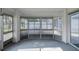 This sun room features all-weather windows providing ample light at 1084 Vista Fina Ct, Spring Hill, FL 34608