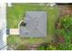 Birds eye view of the property shows the roof and surrounding lush landscape at 11042 Heth Ct, Weeki Wachee, FL 34613