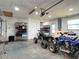 This garage features ATV vehicles and metal shelving at 11340 Corinthian St, Spring Hill, FL 34609