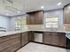 Modern kitchen with stainless steel appliances and granite countertops at 11340 Corinthian St, Spring Hill, FL 34609
