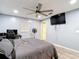 The primary bedroom boasts great light, a ceiling fan, and lots of space for furniture and relaxing at 11340 Corinthian St, Spring Hill, FL 34609