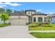 Charming single-Gathering home with a well-manicured lawn and a two-car garage at 11579 Weaver Hollow Rd, New Port Richey, FL 34654