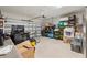 Organized garage featuring ample storage space, tool chests, and a functional layout at 11579 Weaver Hollow Rd, New Port Richey, FL 34654