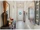 Inviting hallway with wood-look tile flooring and decorative accents at 11579 Weaver Hollow Rd, New Port Richey, FL 34654