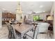 Open concept: dining area flows into kitchen & comfortable living room at 11579 Weaver Hollow Rd, New Port Richey, FL 34654