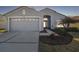 Charming single-Gathering home with a well-manicured lawn and inviting curb appeal at 11637 Spindrift Loop, Hudson, FL 34667