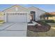 Charming single-Gathering home with a well-manicured lawn and inviting curb appeal at 11637 Spindrift Loop, Hudson, FL 34667