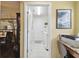 Hallway view to the laundry room and workspace at 11637 Spindrift Loop, Hudson, FL 34667