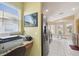 Kitchen featuring stainless steel appliances, a breakfast nook and a workspace at 11637 Spindrift Loop, Hudson, FL 34667