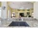 Close up view of the granite countertops and stainless faucet in the kitchen at 11637 Spindrift Loop, Hudson, FL 34667
