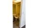 Standard bathroom with a toilet, sink, and bathtub, showcasing a functional space at 11715 Boynton Ln # 74B, New Port Richey, FL 34654
