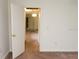 Bright bedroom showcasing a carpet, with a closet view providing a glimpse into the potential storage space at 11715 Boynton Ln # 74B, New Port Richey, FL 34654