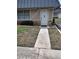 Inviting front entrance features stone accents, neutral paint, and walkway at 11715 Boynton Ln # 74B, New Port Richey, FL 34654