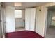 Sun room featuring sliding doors and windows, perfect for relaxing and enjoying the view at 11715 Boynton Ln # 74B, New Port Richey, FL 34654