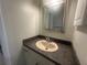 Updated bathroom with granite countertop vanity and new fixtures at 12539 Dearborn Dr # A, Hudson, FL 34667
