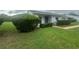 Charming single-story home with a well-manicured lawn and mature landscaping at 12539 Dearborn Dr # A, Hudson, FL 34667