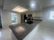 Bright kitchen with a large countertop, stainless steel appliances, and natural light at 12539 Dearborn Dr # A, Hudson, FL 34667