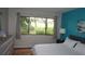 Bedroom featuring a view from the window, and plenty of dresser storage space at 13012 Wedgewood Way # A, Hudson, FL 34667