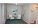 Inviting living room with coastal decor, creating a serene and relaxing atmosphere at 13012 Wedgewood Way # A, Hudson, FL 34667