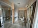Spacious bathroom with tub, toilet and shower, ready for renovation at 13626 Allyn Dr, Hudson, FL 34667