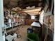 A workshop/garage features organized shelving, tools, and ample workspace at 13626 Allyn Dr, Hudson, FL 34667