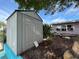Durable outdoor storage shed conveniently located in the backyard near the main house at 13626 Allyn Dr, Hudson, FL 34667
