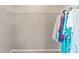 Walk-in closet with wire shelving and hanging storage at 13627 Lightning Rod Ct, Hudson, FL 34669