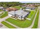 Beautiful single-story home with landscaped front yard, manicured lawn and charming curb appeal at 13627 Lightning Rod Ct, Hudson, FL 34669