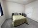 This bedroom is carpeted and features a closet at 1508 Figleaf Ln, Clearwater, FL 33756