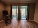 Screened patio with view of landscaping and seating for outdoor enjoyment at 1508 Figleaf Ln, Clearwater, FL 33756
