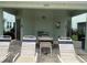Pool community area with lounge chairs, seating, and building at 1508 Figleaf Ln, Clearwater, FL 33756