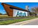 Elegant entrance sign for the Astoria community, featuring modern design and lush landscaping at 15241 Caravan Ave, Odessa, FL 33556
