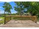The wooden deck provides an inviting space for outdoor enjoyment with a natural and rustic appeal at 16018 Adobe Dr, Hudson, FL 34667