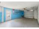 Spacious two-car garage with ample room for parking and storage at 16018 Adobe Dr, Hudson, FL 34667