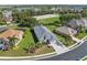 Beautiful single-story home with landscaped front yard and screened-in pool in a desirable community with lake views at 1623 Crossvine Ct, New Port Richey, FL 34655