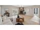 Bright living room features a stone fireplace and modern decor at 1623 Crossvine Ct, New Port Richey, FL 34655