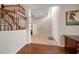 Inviting foyer with staircase, tile flooring, and natural light at 17905 Machair Ln, Land O Lakes, FL 34638