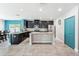 Spacious kitchen with stainless steel appliances and granite countertops with dining area at 18566 Hunters Meadow Walk, Land O Lakes, FL 34638