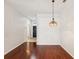 Well lit entryway features hard wood floors and an arched doorway at 18916 New Passage Blvd, Land O Lakes, FL 34638